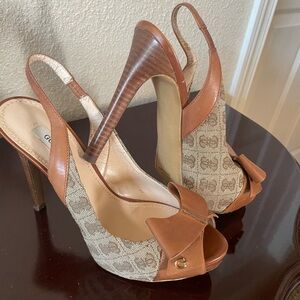 Pre-own Guess platform heels open toe shoes brown camel color size 8